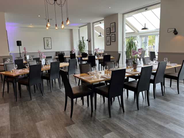 Tulip Tree Room at RHS Garden Wisley, elegant dining space for corporate events and gatherings.