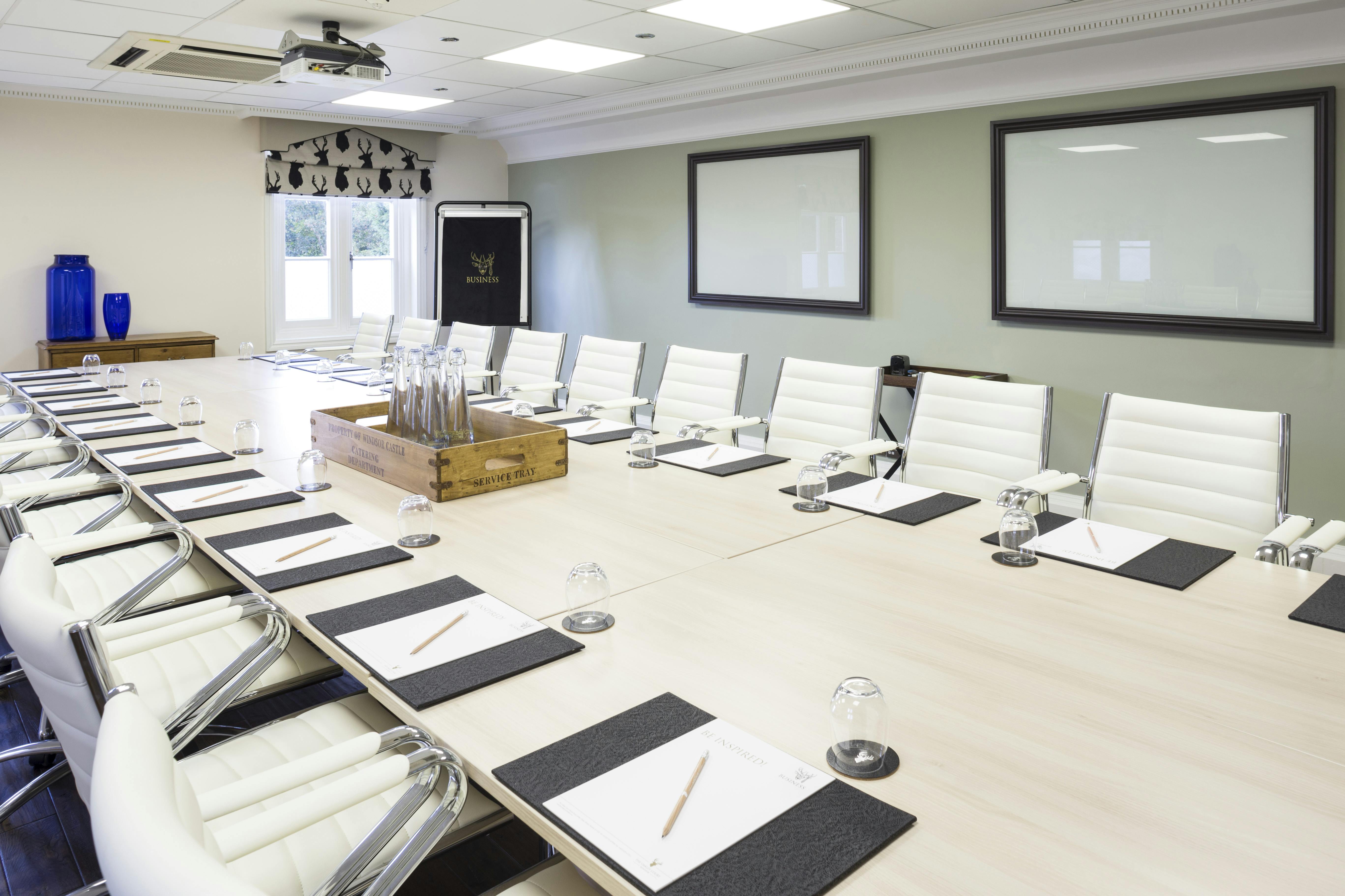 Modern conference room in Richmond Suite, ideal for meetings and presentations.