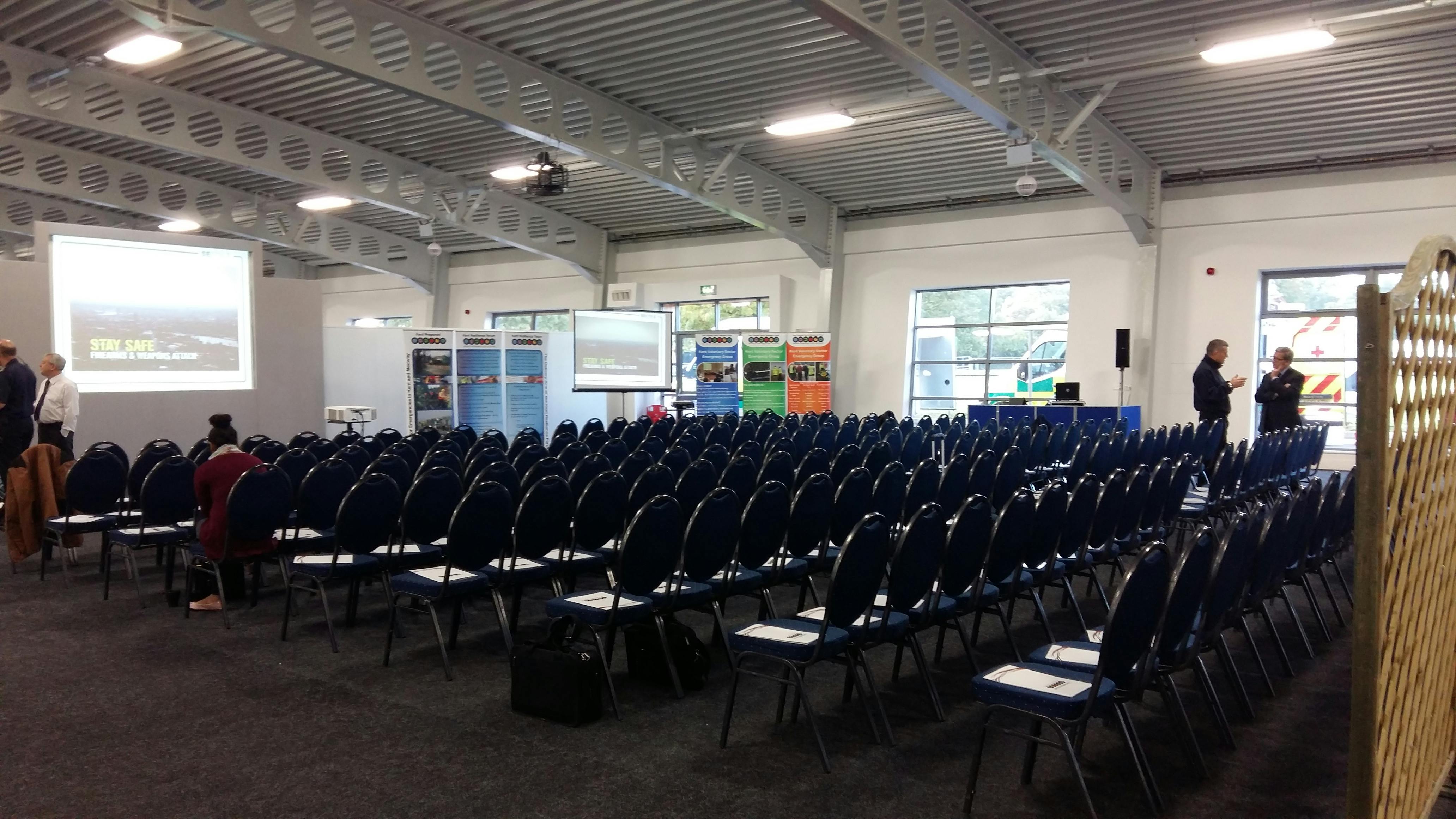 Maidstone Exhibition Hall conference setup with arranged chairs for networking and presentations.