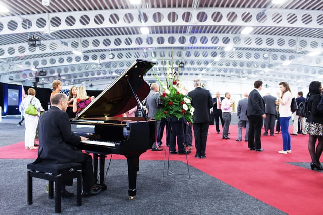 Maidstone Exhibition Hall with pianist, elegant networking event space in Kent.