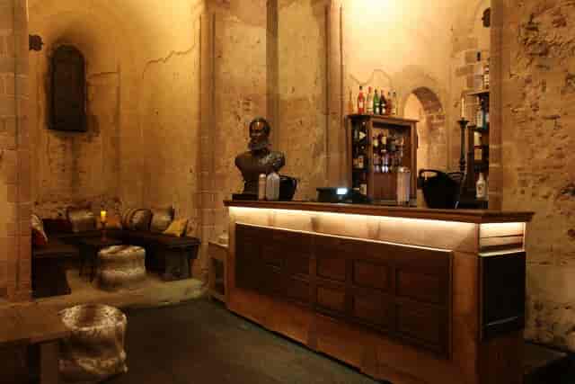 Garrison Floor at Hedingham Castle: rustic bar in a historic event space for gatherings.