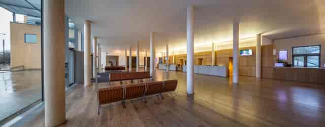 Edmond Safra Lecture Theatre lobby, modern design for conferences and events.