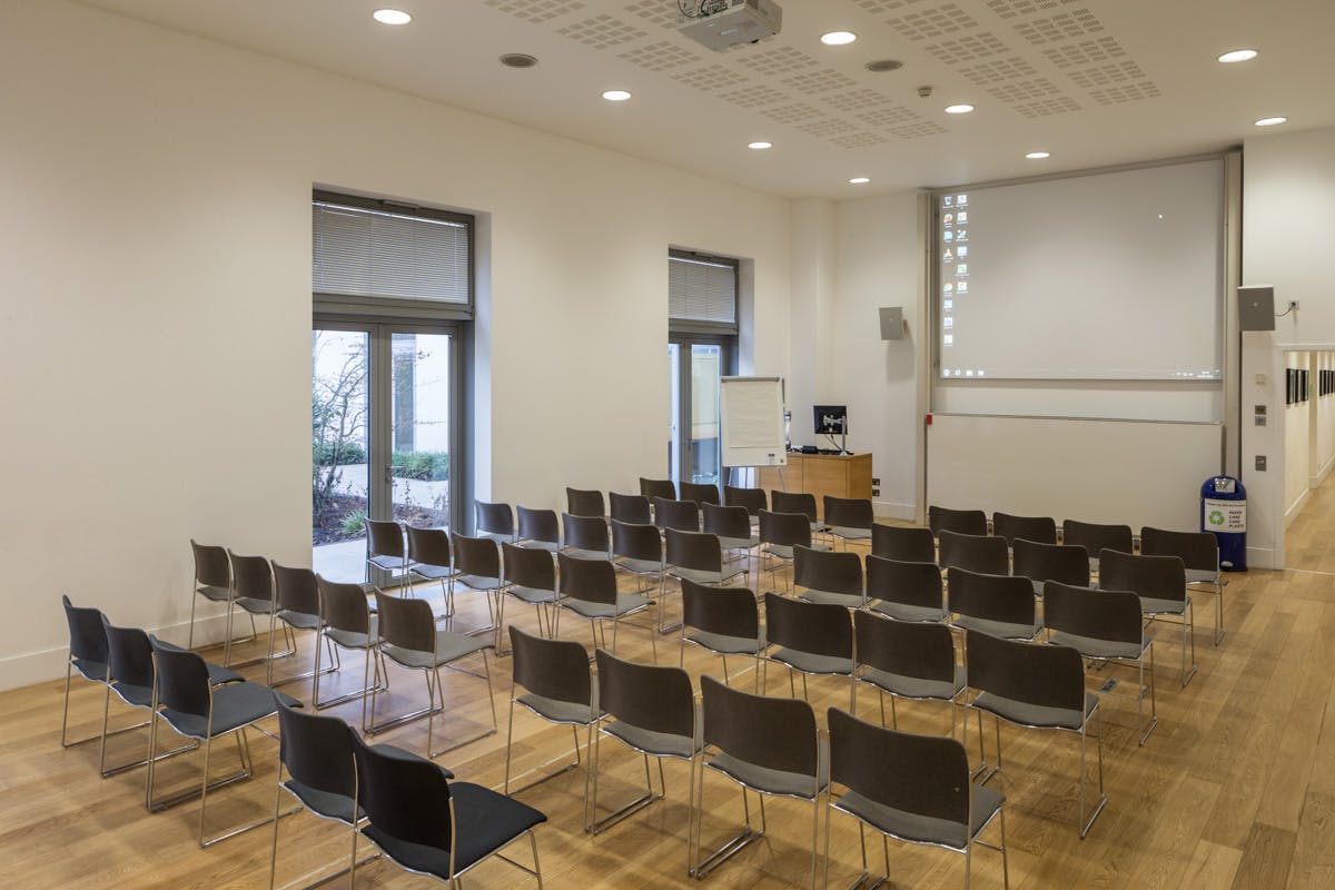 Seminar Room A at Saïd Business School, modern chairs for workshops and seminars.