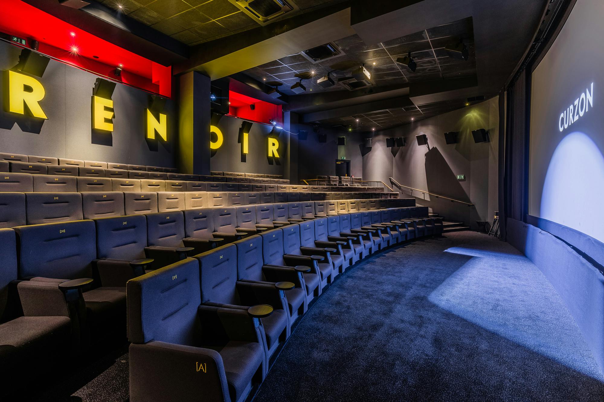 Modern auditorium with tiered seating at Curzon Bloomsbury for screenings and events.