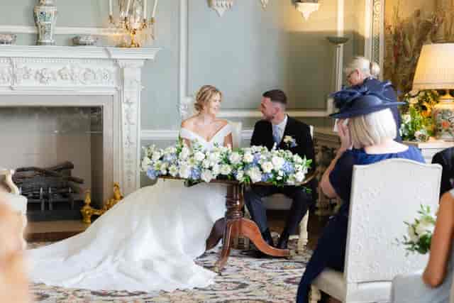 Leeds Castle wedding ceremony with elegant tablescape and Georgian architecture.