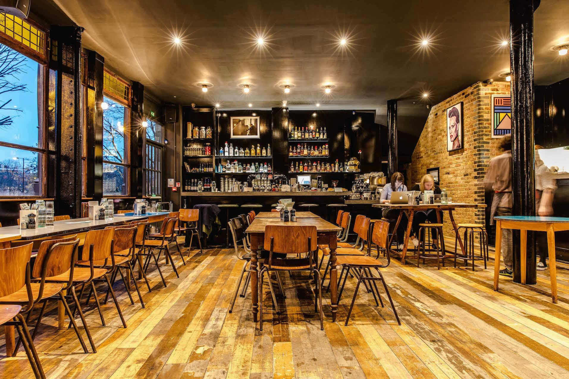 Modern venue with warm lighting, ideal for intimate meetings and events.