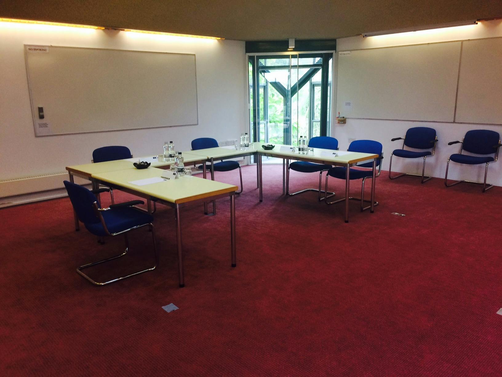 East Lecture Room at Egrove Park, Oxford: bright meeting space for workshops and discussions.