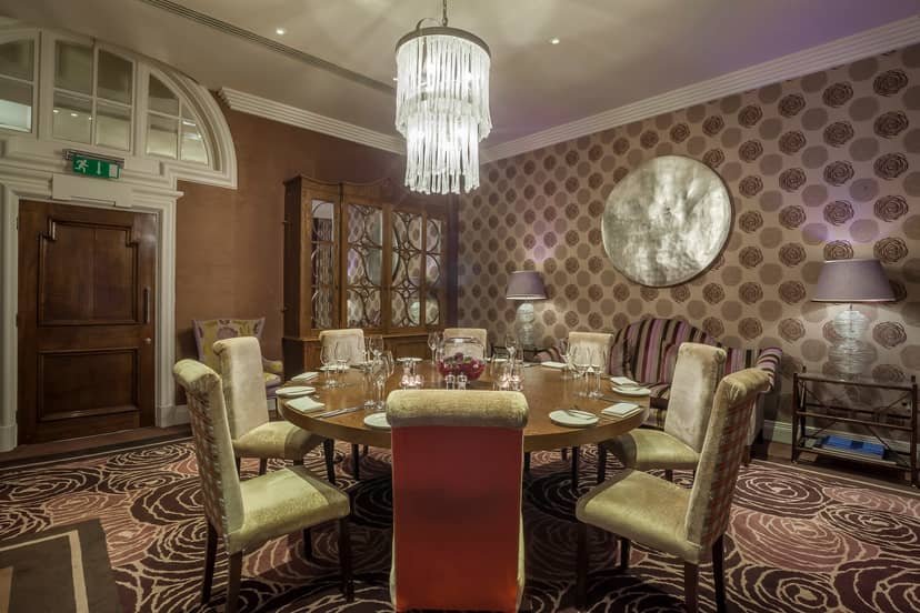 Elegant meeting room at The Roseate, Reading with round table for executive gatherings.