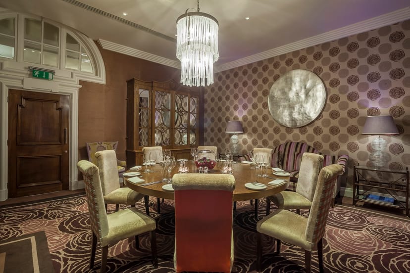 Elegant meeting room at The Roseate, Reading with round table for executive gatherings.