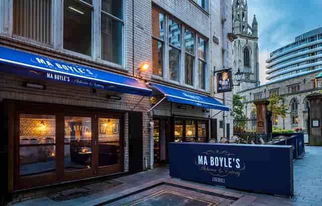 Rum and Rumour Kabaret Bar outdoor seating, ideal for casual meetings and social events.