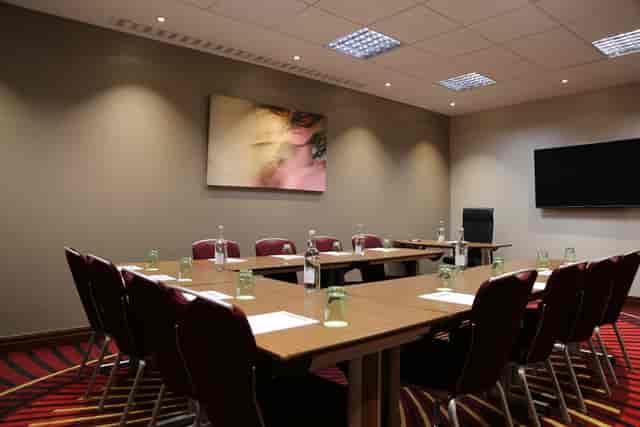 Executive Boardroom 1-3 at Holiday Inn Kensington - corporate meetings, ergonomic setup.