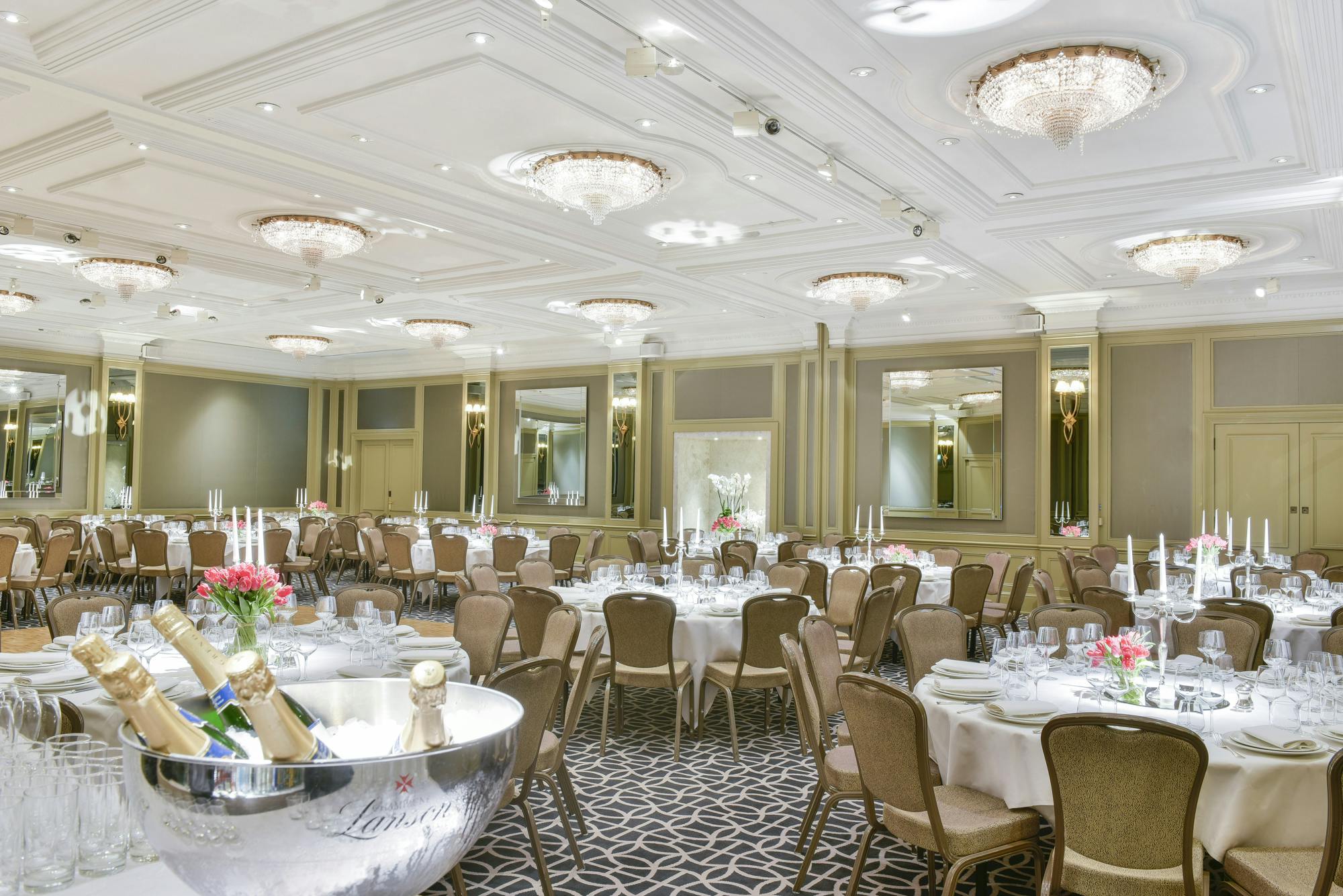 Elegant Chartwell Ballroom with round tables, ideal for weddings and corporate events.