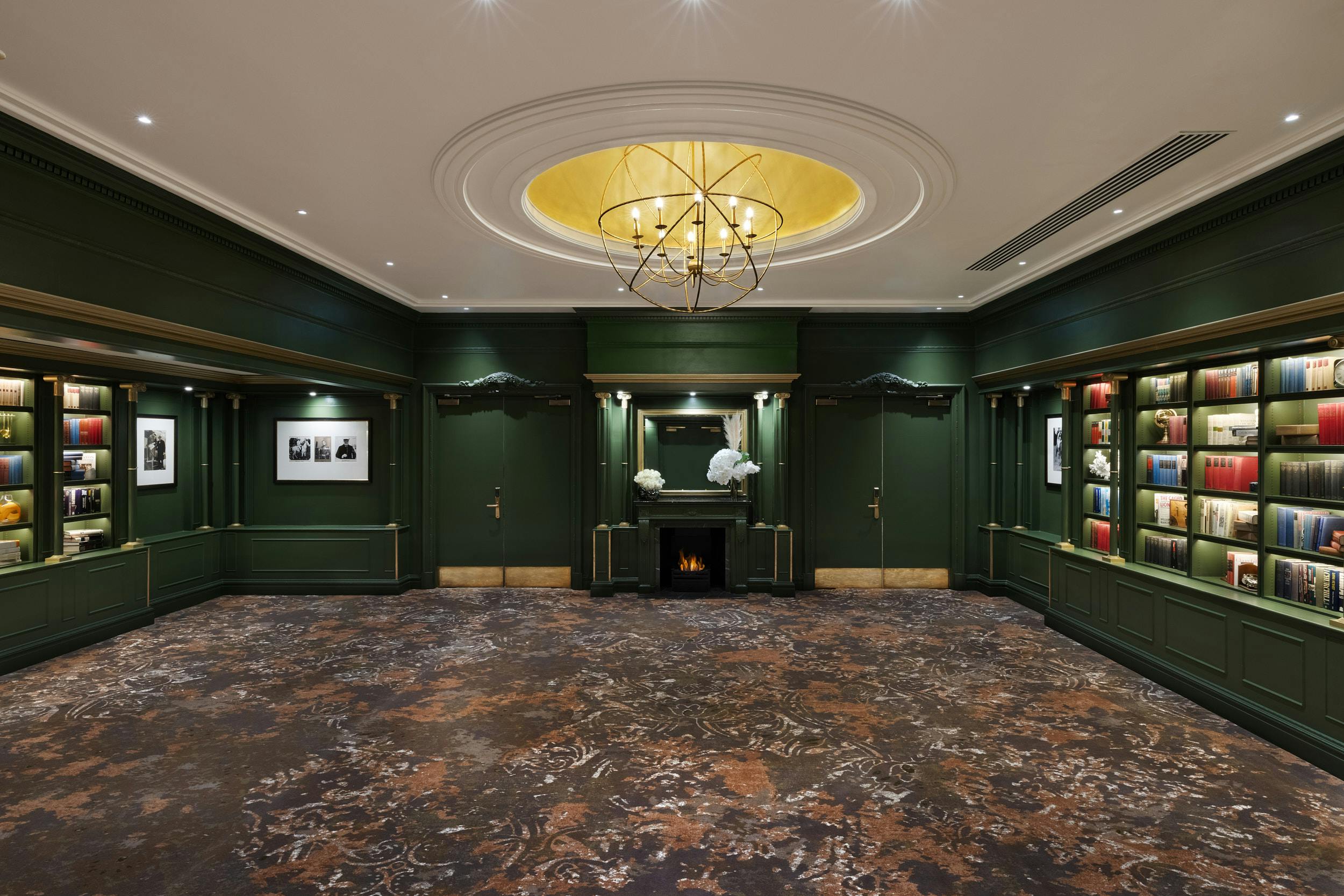 Library Suite at Hyatt Regency London - The Churchill, elegant green walls, ideal for meetings.