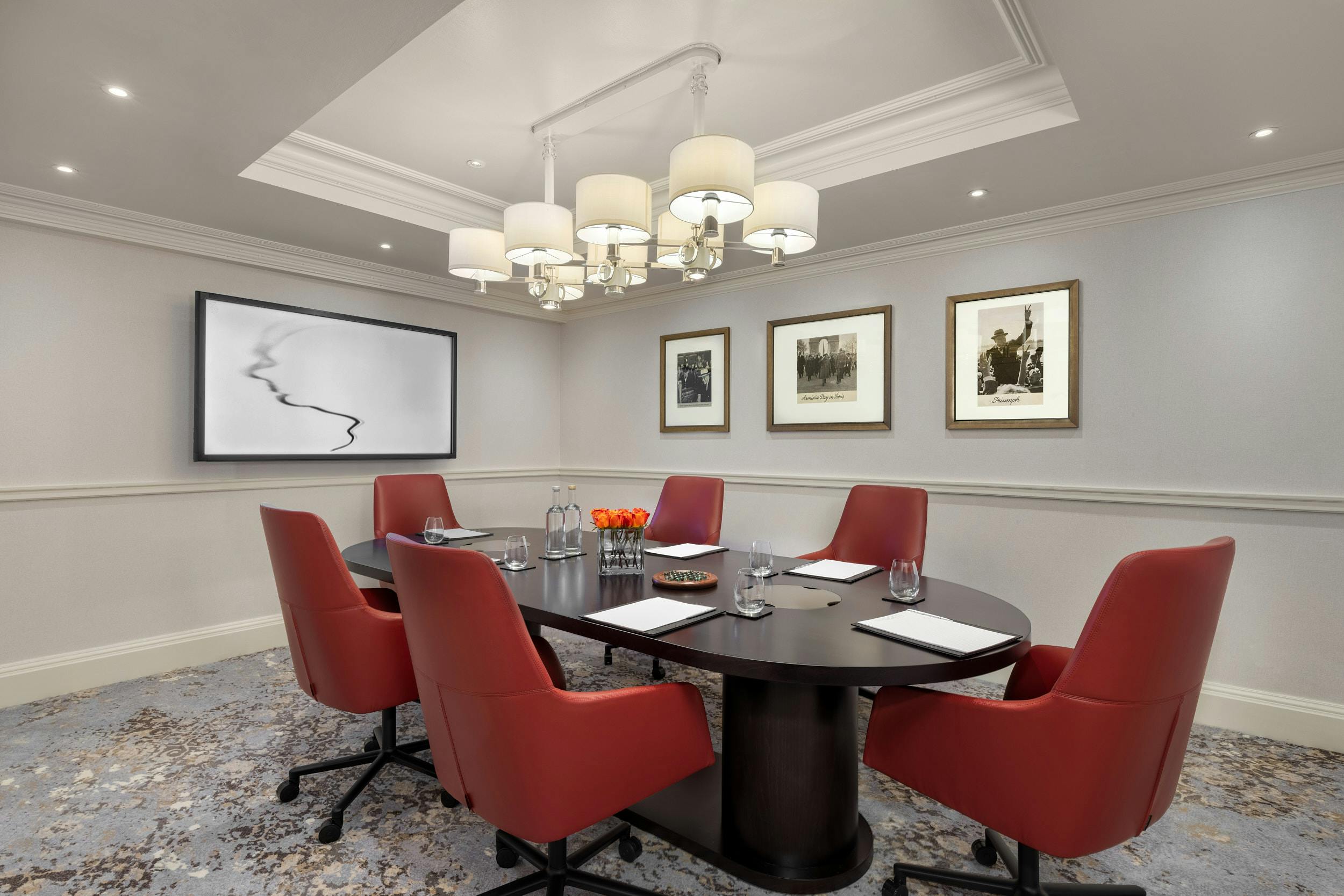 Boardroom 2 at Hyatt Regency London, featuring a round table for meetings and presentations.