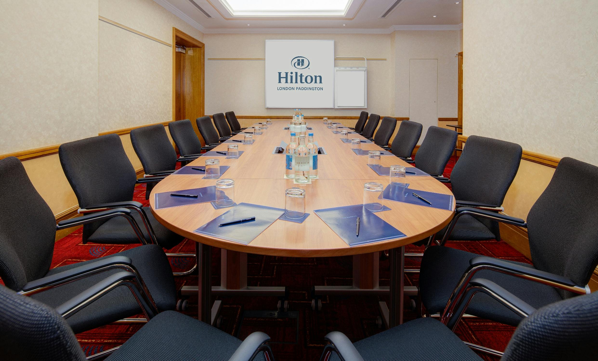 Kingfisher meeting room at Hilton London Paddington, ideal for corporate events and presentations.