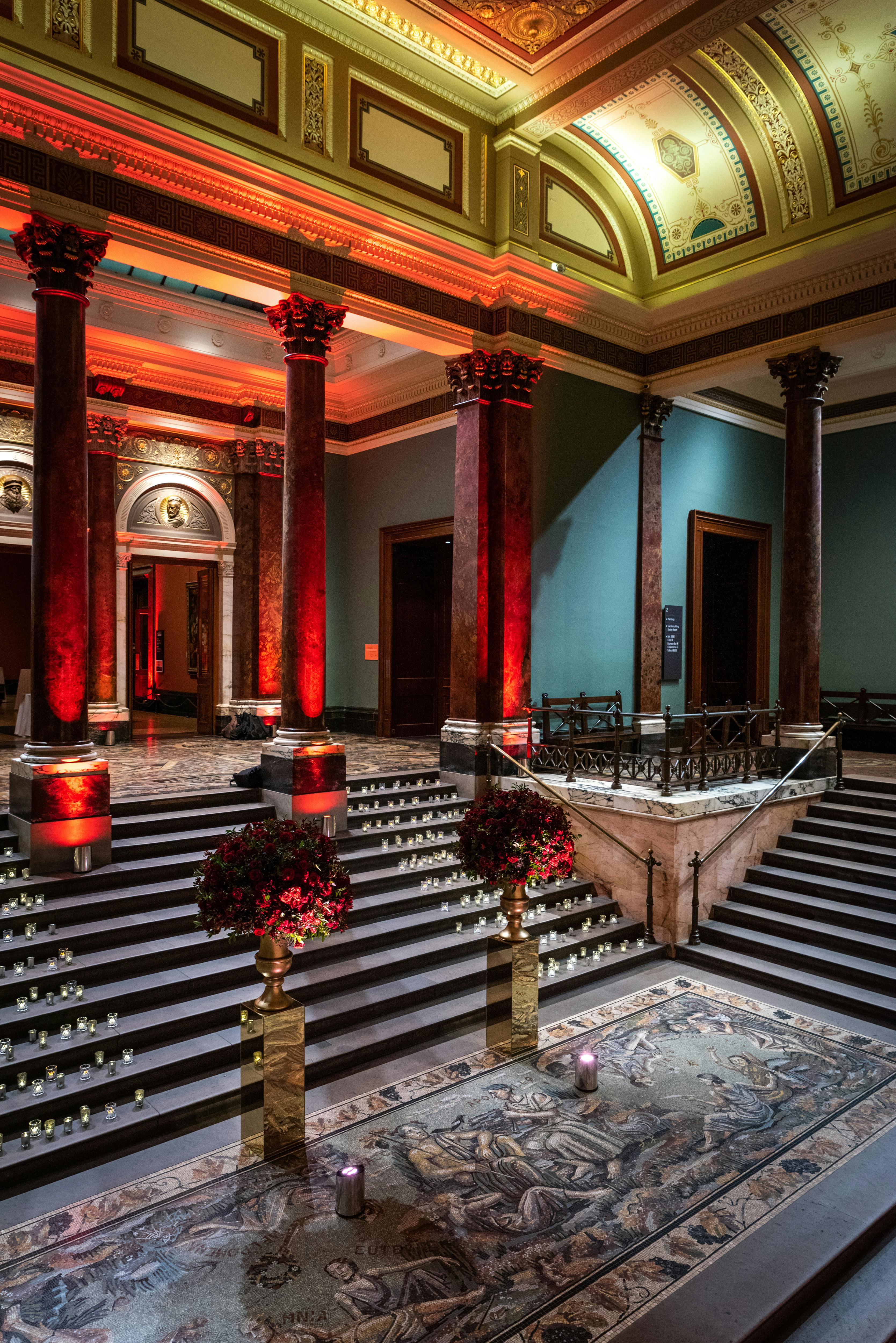Mosaic Terrace at The National Gallery, elegant event space with tall columns and floral decor.