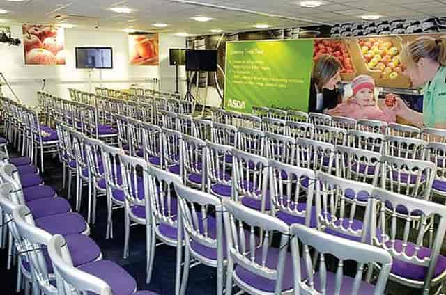 Elegant conference room setup for corporate presentations with multimedia features.