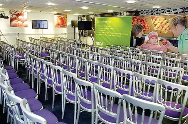Elegant conference room setup for corporate presentations with multimedia features.