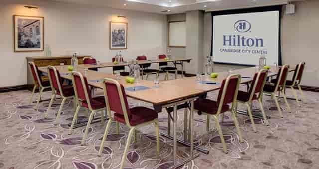 Tennyson suite at Hilton Cambridge, U-shaped meeting room for corporate events.