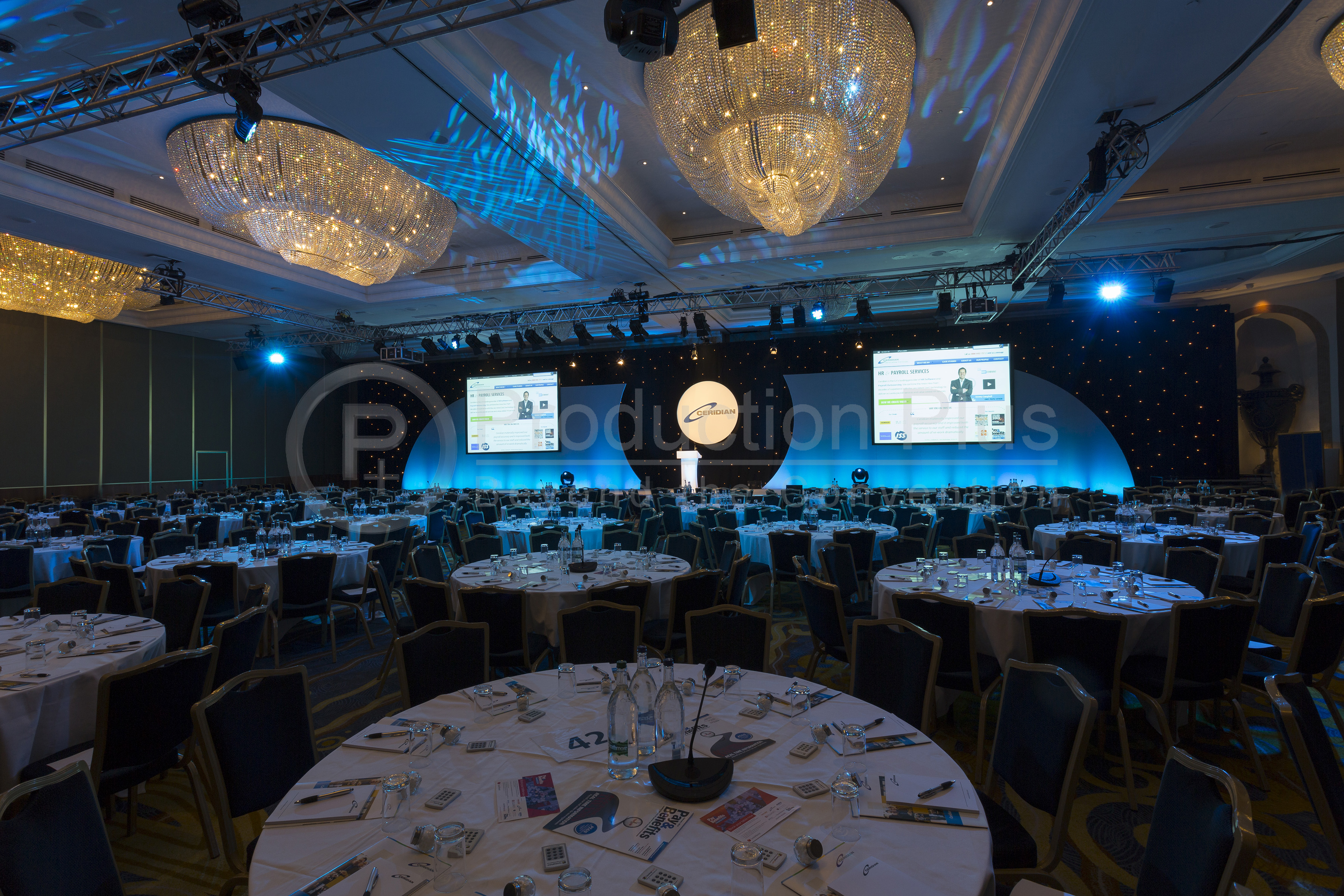 Grand Ballroom at London Hilton, elegantly set for conferences and award ceremonies. - Banner