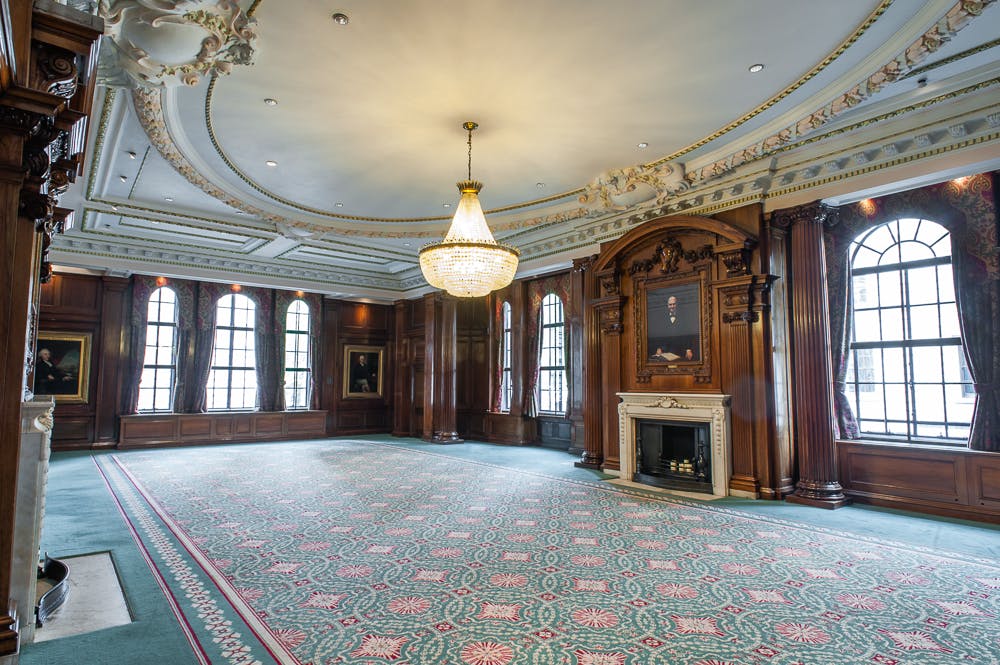 Elegant Smeaton Room with wood paneling, ideal for meetings and events.