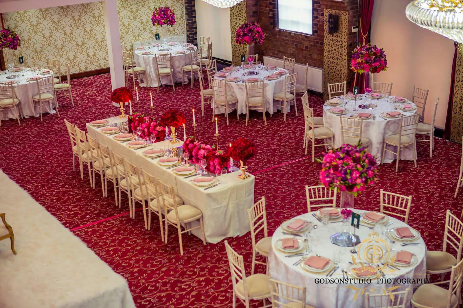 Lakeview Suite at Regents Lake: elegant wedding venue with floral centerpieces and rich decor.