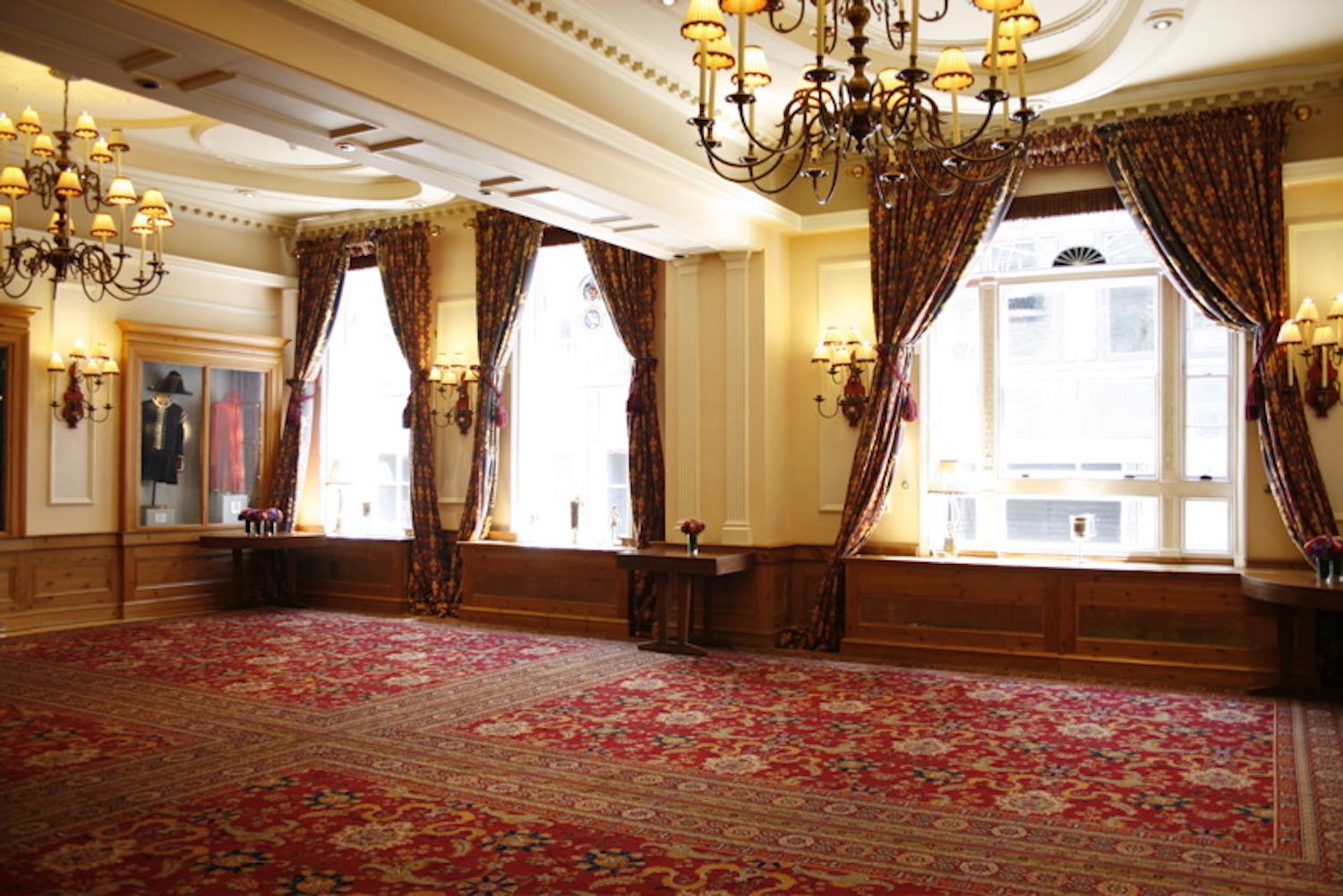 Elegant Watermen's Hall venue with chandeliers, perfect for upscale events and gatherings. - Banner