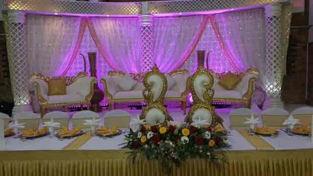 Elegant Starlite Suite with luxurious seating, perfect for weddings and formal events.
