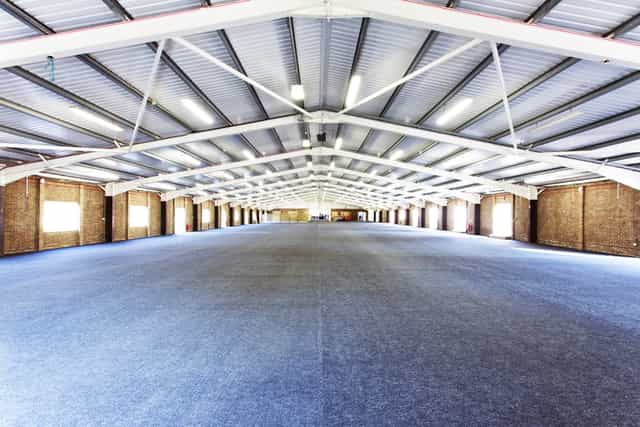 John Hendry Pavilion: spacious event venue with high ceilings for trade shows and exhibitions.