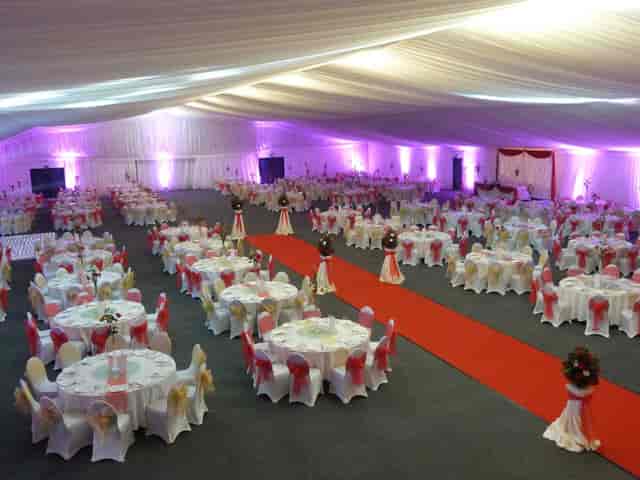 Clive Emson Conference Hall with elegant tables, perfect for weddings and corporate events.
