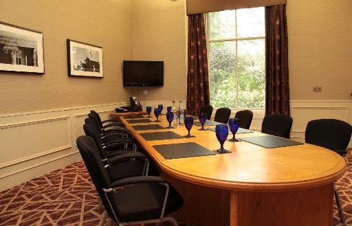 Elegant Manor Room at Edinburgh Grosvenor Hotel, perfect for meetings and events.