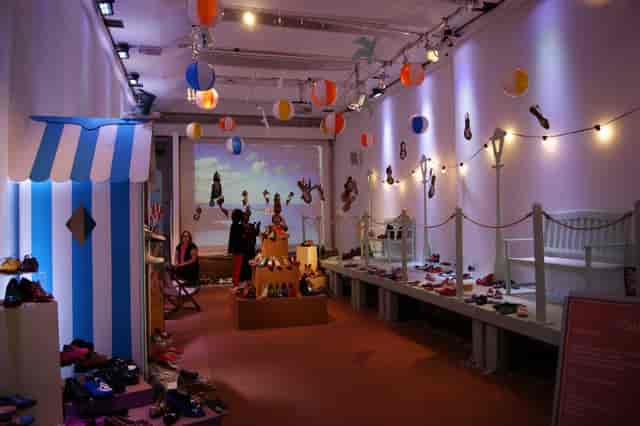 Vibrant beach-themed event space with colorful decor for immersive experiences.