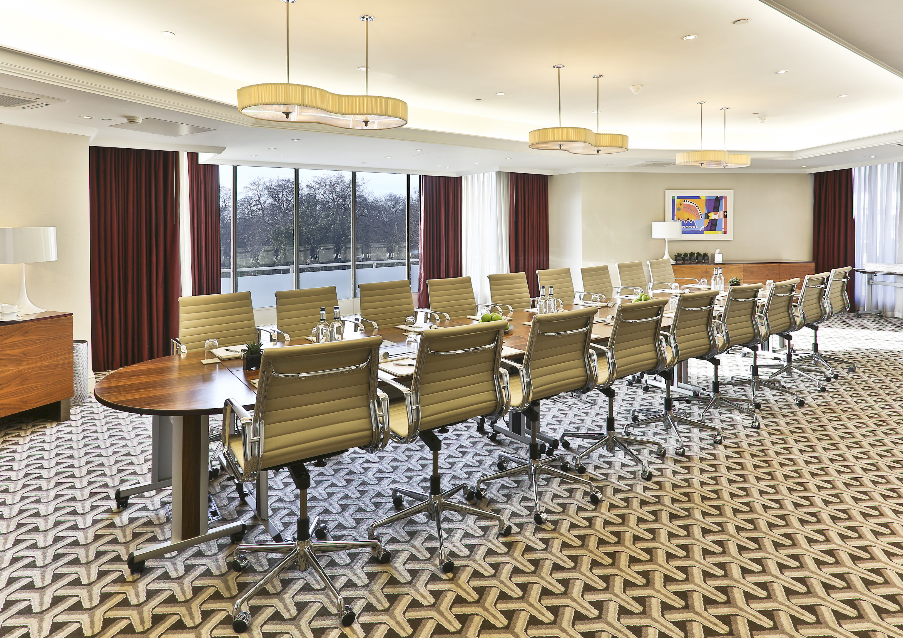 Serpentine Suite conference room with polished table, ideal for corporate events in London. - Banner