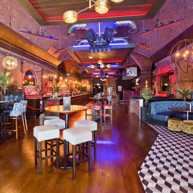 Canal Bar Manchester: Industrial-chic event venue with ambient lighting for networking and activations.