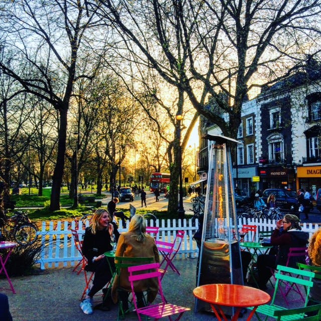 Vibrant outdoor terrace with colorful seating for casual networking events and receptions.