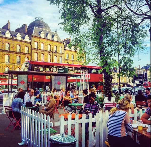 Vibrant outdoor venue with colorful seating for casual networking events and gatherings.
