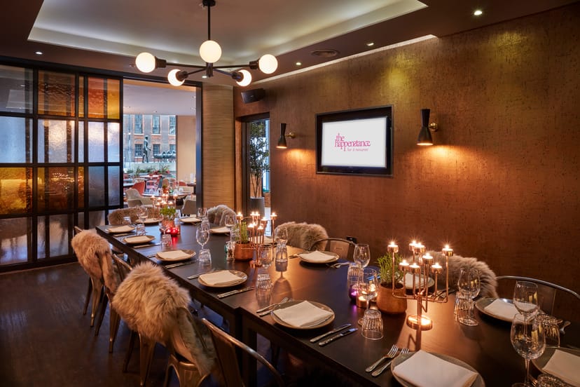 Elegant private dining room with modern decor for corporate dinners and intimate gatherings.