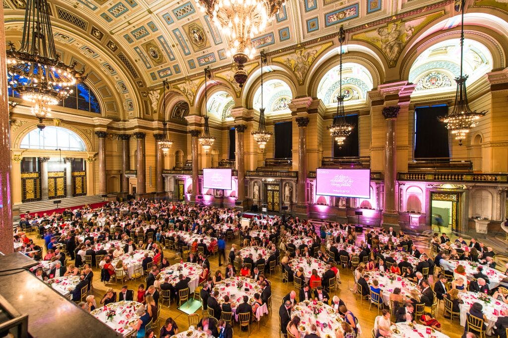 Great Hall in St George's Hall, elegant tables set for formal dinner or gala event.