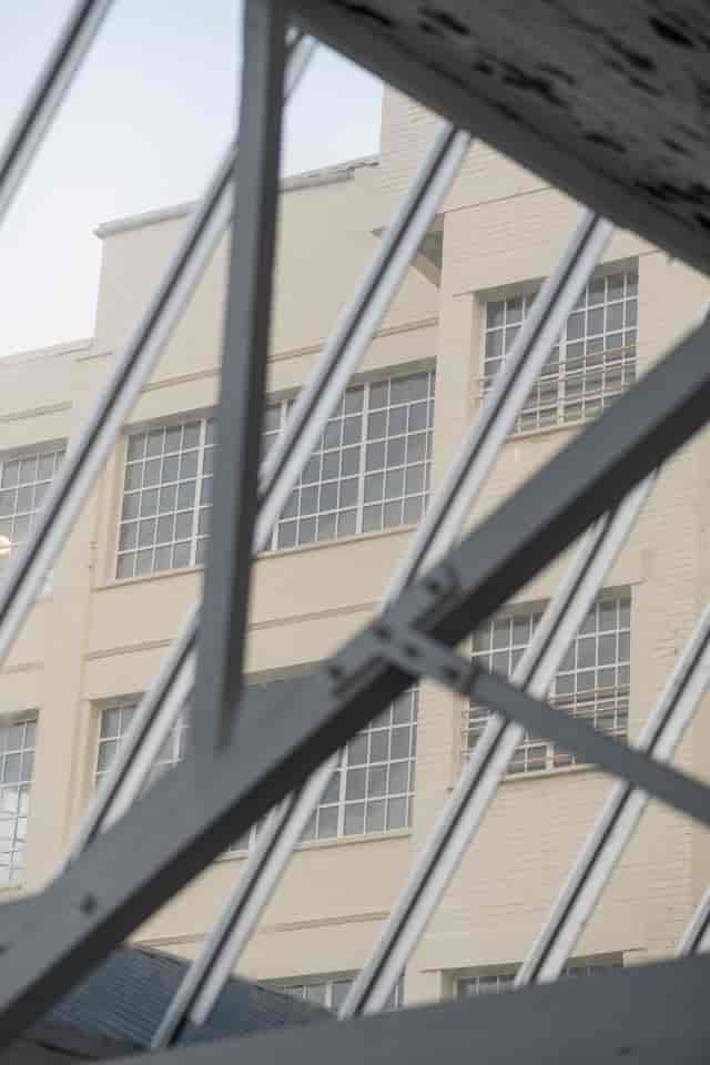 Modern venue with large windows at Factory Works, ideal for events and networking.