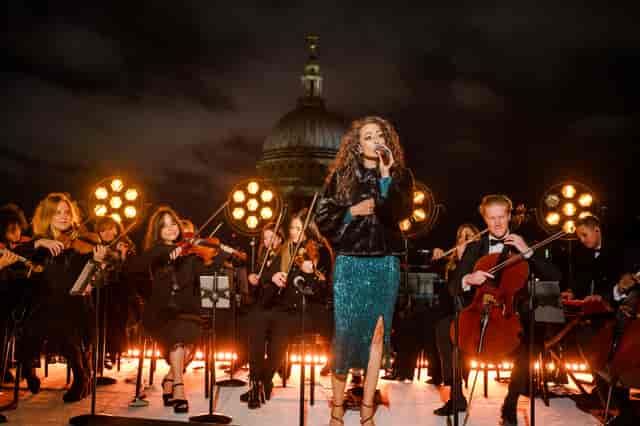 "VIP Terrace outdoor event with live performance and elegant orchestra backdrop"