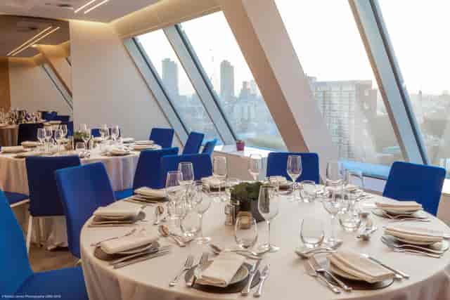 Urban Coterie private dining room with skyline views for corporate luncheon and networking gala.