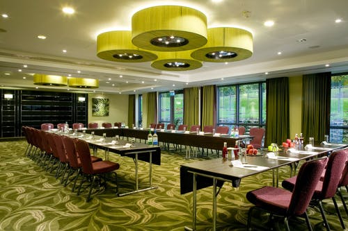 Hurst Castle Suite meeting room with U-shaped table, ideal for corporate events.