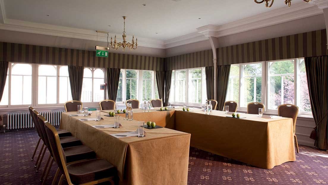 Verandah meeting room at Norton House Hotel, U-shaped table for corporate events.