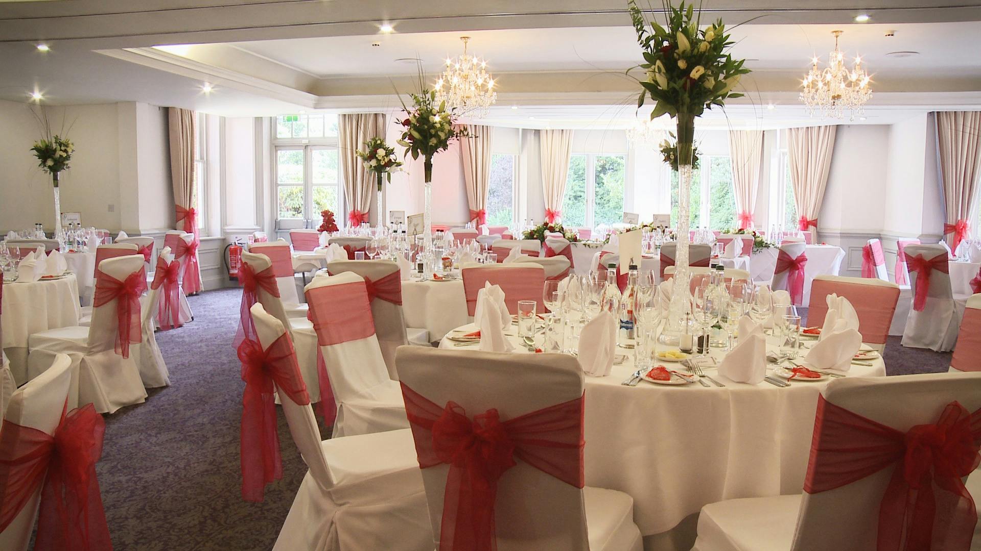 Prince of Wales Suite at Woodlands Park Hotel, elegant wedding venue with pink accents.