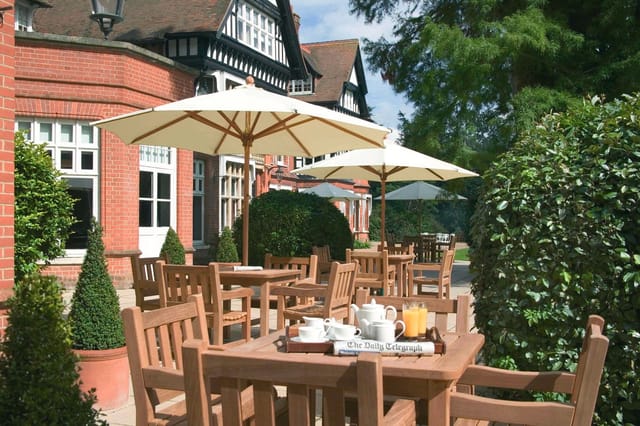 Prince of Wales Suite outdoor space with tables, ideal for networking events and meetings.