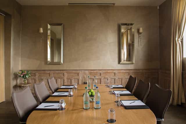 Saunders Room at Fawsley Hall: elegant meeting space for intimate gatherings and events.