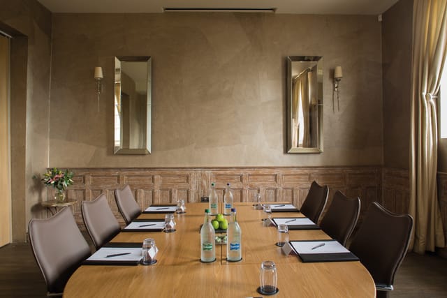 Saunders Room at Fawsley Hall: elegant meeting space for intimate gatherings and events.