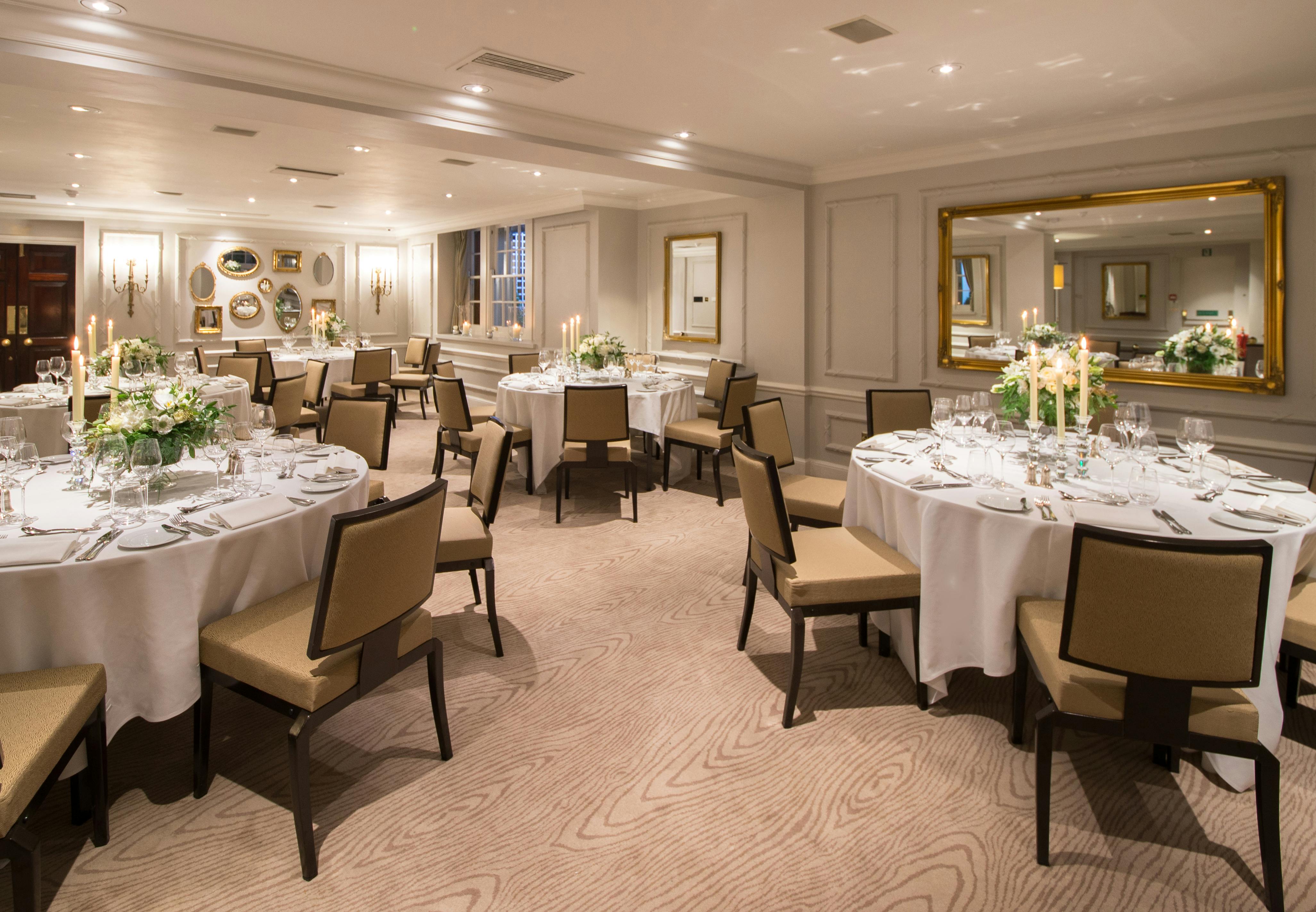 St James Suite at DUKES LONDON, elegant dinner setup for corporate events and weddings.