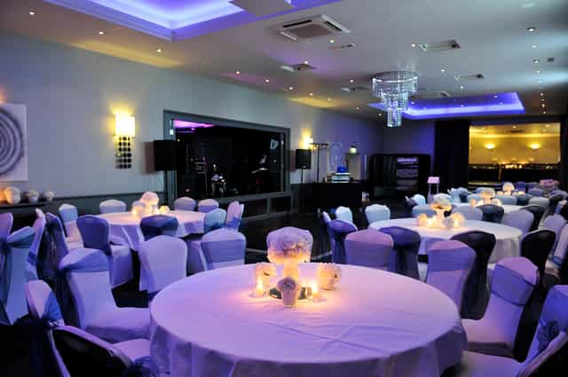 Grand Suite at Grand Jersey Hotel, elegant wedding event space with blue accents.