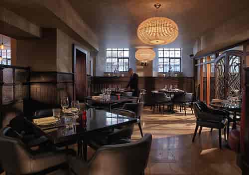 Chez Mal Brasserie in Leeds: elegant dining space with chandeliers for events and meetings.